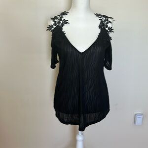Black cold shoulder V-neck, top with crochet floral shoulders